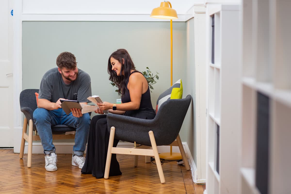 Dan and Sophie looking at Pantone colours